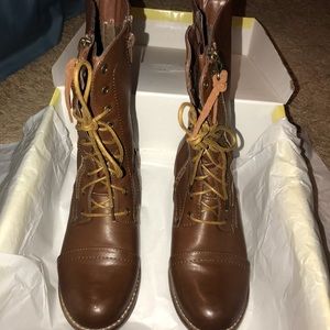 Brown leather combat boots